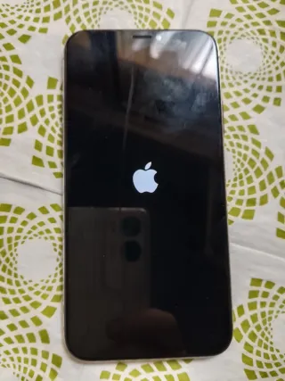 iPhone X Plata con Funda Azul