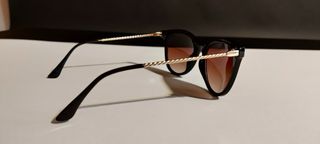 Occhiali da sole donna neri e marroni