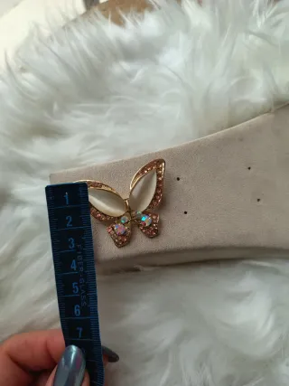 Spilla farfalla vintage dorata con pietre