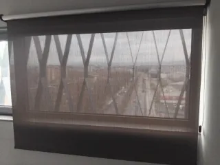 Cortinas enrollable gris tela tengo 10 juegos