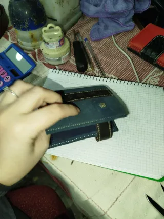 Cartera de hombre azul y marrón