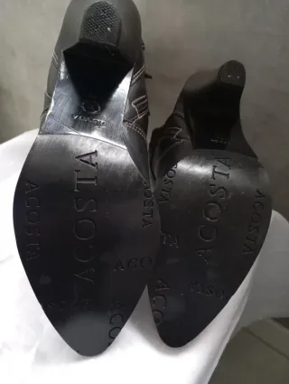 Botas altas de tacón negras