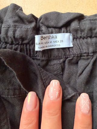 Shorts negros de lino con cinturón