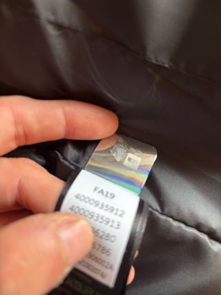 Plumas The North Face Negro