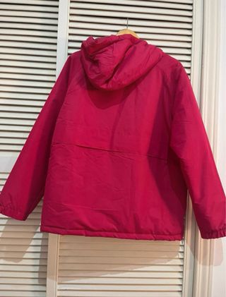 Chaqueta cortavientos con capucha rosa Décimas XL