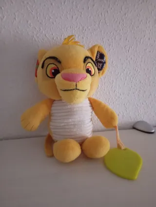 Peluche sonajero león