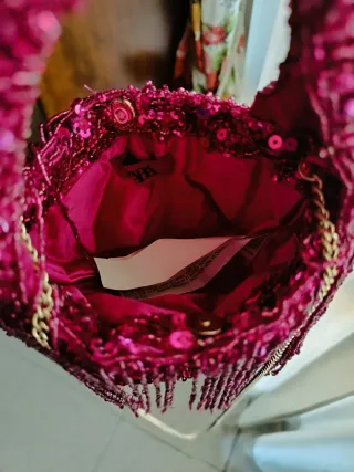 Borsetta con paillettes e frange