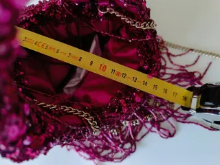 Borsetta con paillettes e frange