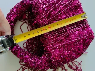 Borsetta con paillettes e frange