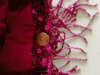 Borsetta con paillettes e frange