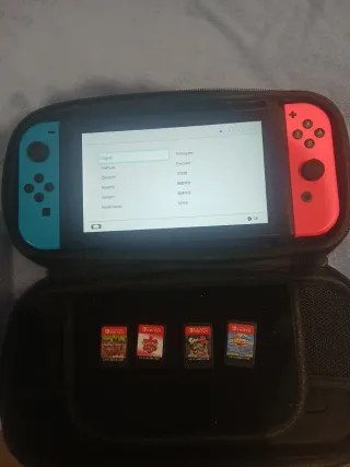 Nintendo Switch con 4 juegos