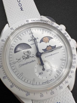 Swatch omega Moonshine Gold cold moon