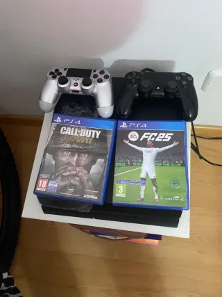 PS4 con 2 mandos y 2 juegos