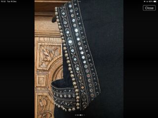 Chaleco de lujo con adornos metálico y mini espejo