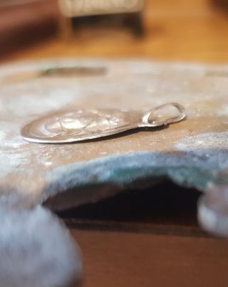 Antigua medalla religiosa de plata