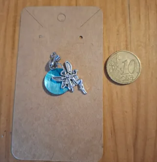 *Colgantes Diseños* (concha de mar colores)