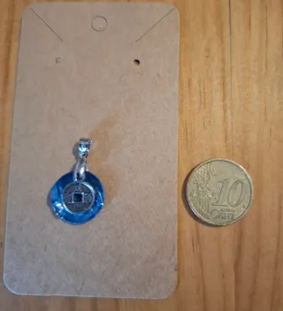 *Colgantes Diseños* (concha de mar colores)