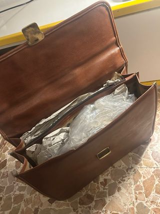 24 ore vera pelle anni '70, con chiave; mai usata