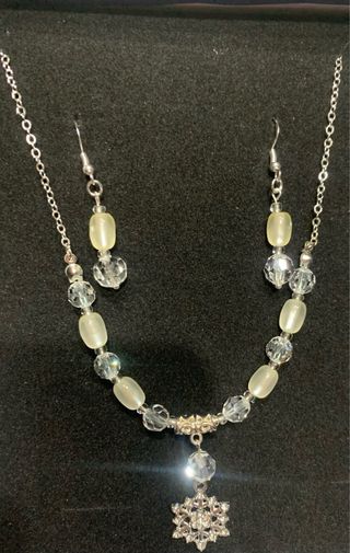 Parure perla e fiocco di neve