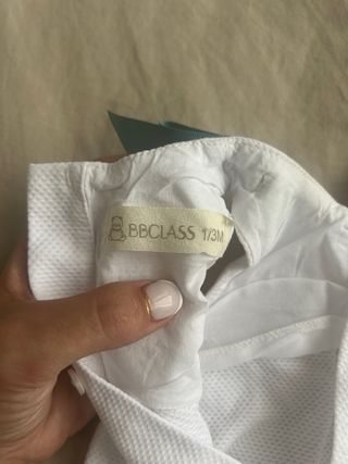 Ranita bebé blanca con lazos