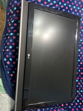 LG TV Negra y Plateada