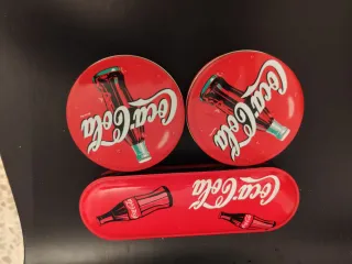 2 Sets  4 posavasos y estuche metálico d Coca-Cola