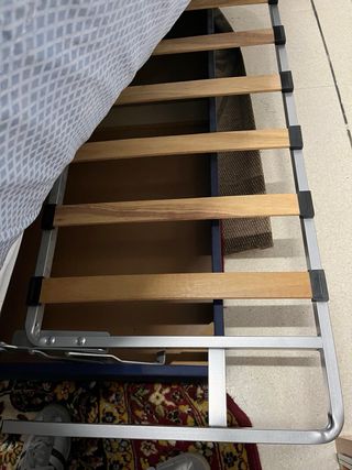 Sofá cama tela cuadros azul y amarillo