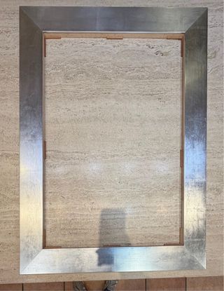 Marco de metal plateado