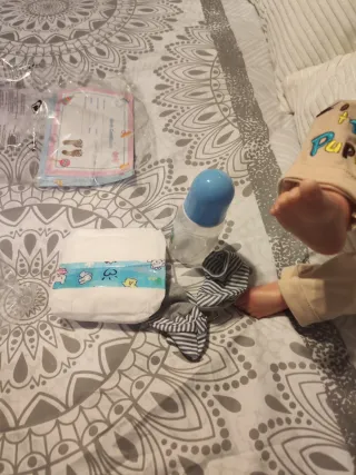 Muñeco bebé realista pelo rubio