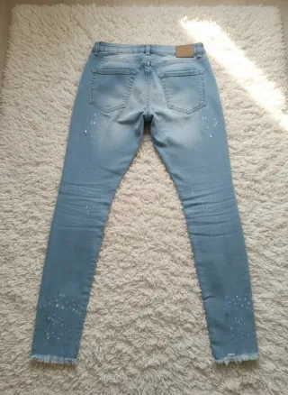 Pantalón vaquero skinny con flecos