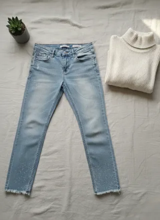 Pantalón vaquero skinny con flecos