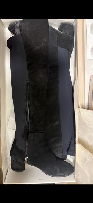 Botas altas piel vuelta negras