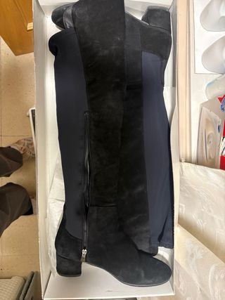 Botas altas piel vuelta negras