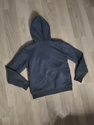 Sudadera Quiksilver gris con capucha y cremallera