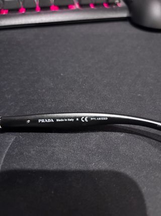 Gafas de sol Prada negras y plateadas