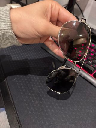 Gafas de sol Prada negras y plateadas