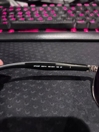 Gafas de sol Prada negras y plateadas