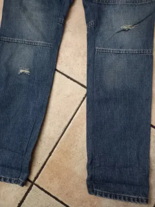 Jeans vintage blu con patch