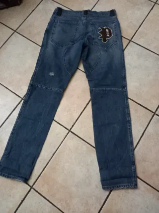 Jeans vintage blu con patch