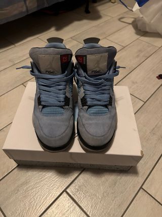Jordan 4 University Blu Grigio