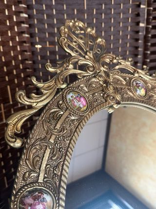 Espejo (1900-1920) de bronce y porcelana