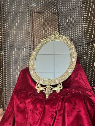 Espejo (1900-1920) de bronce y porcelana