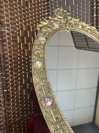 Espejo (1900-1920) de bronce y porcelana