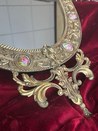 Espejo (1900-1920) de bronce y porcelana