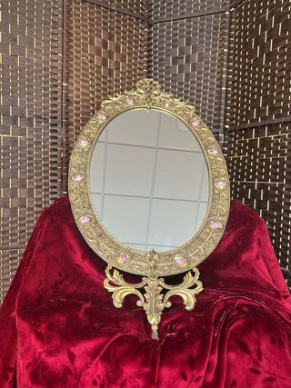 Espejo (1900-1920) de bronce y porcelana