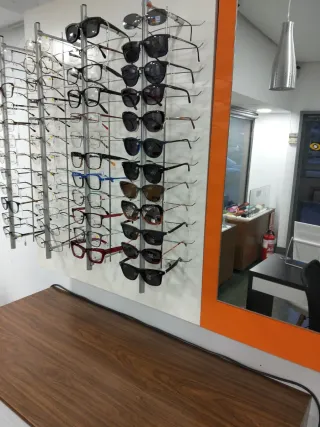 Barra expositora óptica