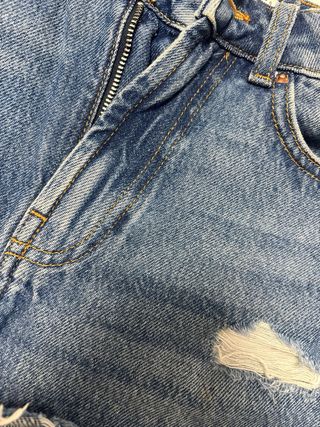 Pantalones cortos vaqueros rotos