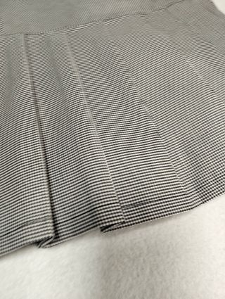 Minigonna a pieghe quadretti Militea Spandex