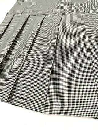 Minigonna a pieghe quadretti Militea Spandex