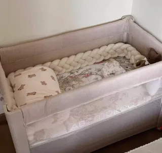 Cuna plegable con ruedas